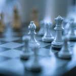 Chess pieces strategically positioned to symbolize the concept of strategy deployment.