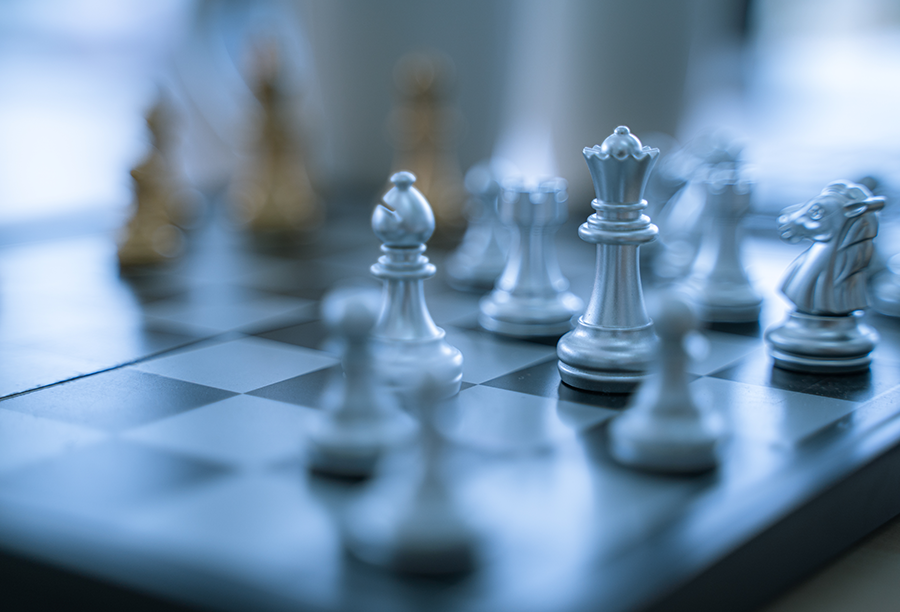 Chess pieces strategically positioned to symbolize the concept of strategy deployment.