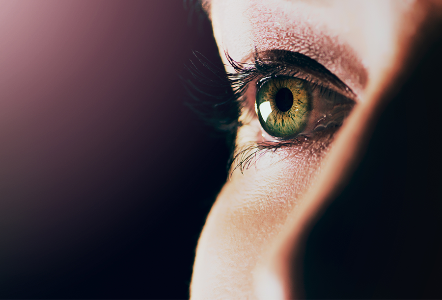 Close-up image of a woman's thoughtful eye, symbolizing the concept of a visual workplace.
